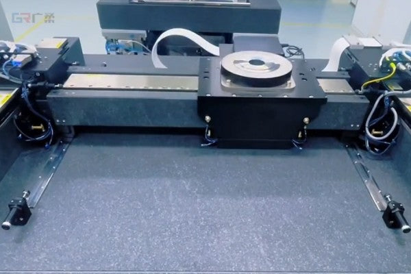 What is the function of a dust-free cable carrier in industrial settings